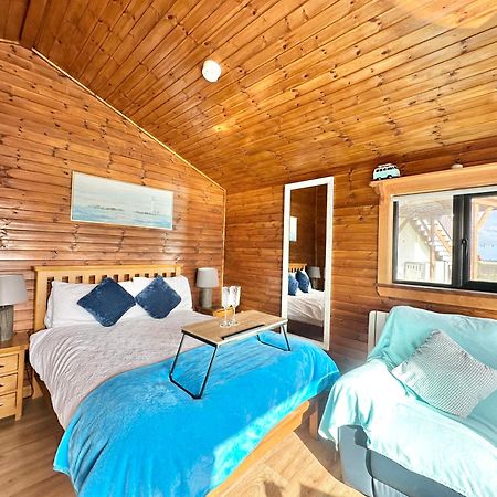 Cosy Portmor Log Cabin- Sea Views, Deck & Relaxation Malin Head ภายนอก รูปภาพ